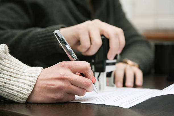 Notary public in office stamping document